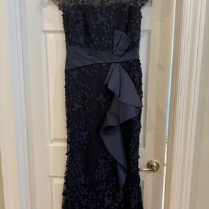 Carmen Marco Volvo Infusion 3D Ruffle Taffeta Gown in navy.